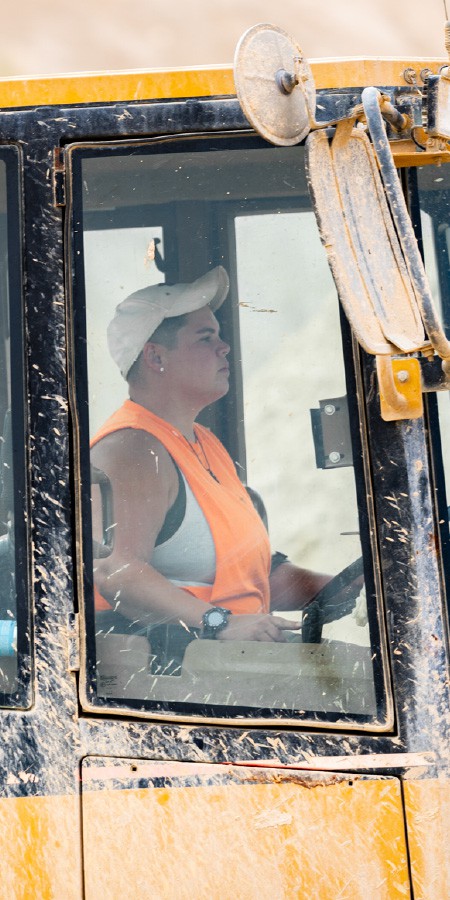 Wendling worker in construction vehicle.
